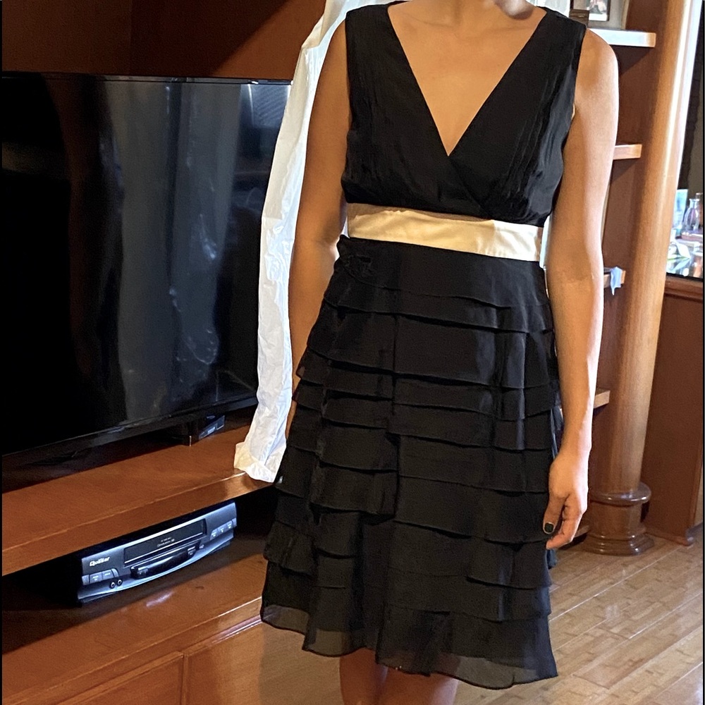 Black ruffle dress BCBG with beige/ cream ribbon V neck